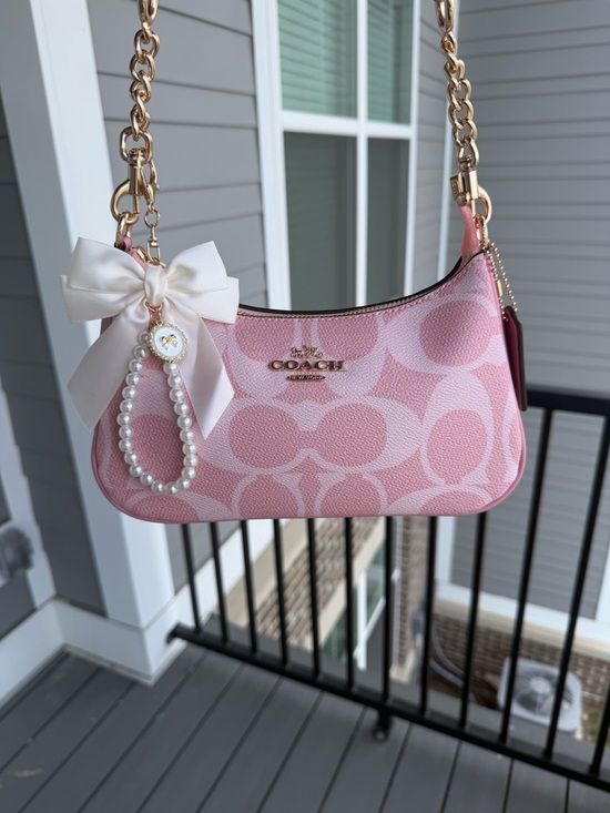 Coach Handbags - Coach Pink Signature Shoulder Bag with Bow Charm